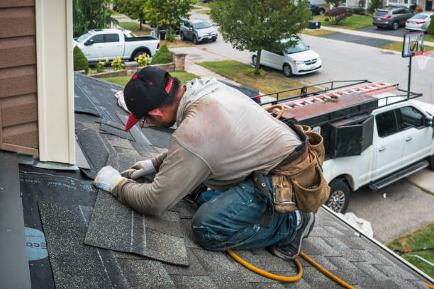 Professional Flat Roof Repair technician working in Lawson, MO